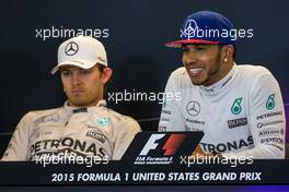 (L to R): Nico Rosberg (GER) Mercedes AMG F1 with team mate Lewis Hamilton (GBR) Mercedes AMG F1 in the FIA Press Conference. 25.10.2015. Formula 1 World Championship, Rd 16, United States Grand Prix, Austin, Texas, USA, Race Day.