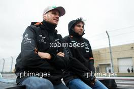 (L to R): Nico Hulkenberg (GER) Sahara Force India F1 with team mate Sergio Perez (MEX) Sahara Force India F1 on the drivers parade. 25.10.2015. Formula 1 World Championship, Rd 16, United States Grand Prix, Austin, Texas, USA, Race Day.