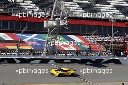 Checkred Flag GTLM Winner; for Jan Magnussen (DEN) Antonio Garcia (ESP) Ryan Briscoe (AUS) Corvette Racing Chevrolet Corvette C7.R 25.01.2015. Rolex 24, Saturday, Race, Daytona, USA.