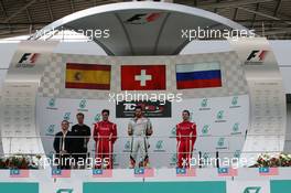 Race 1, 1st position Stefano Comini (SUI) SEAT Leon Racer, Target Competition, 2nd position Pepe Oriola (ESP) SEAT Leon Racer, Team Craft-Bamboo LUKOIL and 3rd position Sergey Afanasyev (RUS) SEAT Leon Racer, Team Craft-Bamboo LUKOIL 28.03.2015. TCR International Series, Rd 1, Sepang, Malaysia, Saturday.