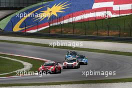 Pepe Oriola (ESP) SEAT Leon Racer, Team Craft-Bamboo LUKOIL and Gianni Morbidelli (ITA), Honda Civic TCR, West Coast Racing 29.03.2015. TCR International Series, Rd 1, Sepang, Malaysia, Sunday.