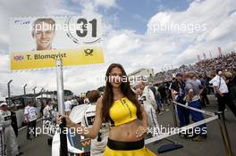 Grid girl of Tom Blomqvist (GBR) BMW Team RBM, BMW M4 DTM. 26.06.2016, DTM Round 4, Norisring, Germany, Race 2, Sunday.