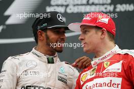 (L to R): Race winner with Lewis Hamilton (GBR) Mercedes AMG F1 on the podium. 03.07.2016. Formula 1 World Championship, Rd 9, Austrian Grand Prix, Spielberg, Austria, Race Day.