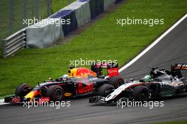 Daniel Ricciardo (AUS) Red Bull Racing RB12 and Nico Hulkenberg (GER) Sahara Force India F1 VJM09. 03.07.2016. Formula 1 World Championship, Rd 9, Austrian Grand Prix, Spielberg, Austria, Race Day.