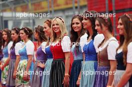 Formula Una girls on the drivers parade. 03.07.2016. Formula 1 World Championship, Rd 9, Austrian Grand Prix, Spielberg, Austria, Race Day.