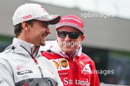 (L to R): Esteban Gutierrez (MEX) Haas F1 Team with Kimi Raikkonen (FIN) Ferrari on the drivers parade. 03.07.2016. Formula 1 World Championship, Rd 9, Austrian Grand Prix, Spielberg, Austria, Race Day.