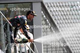 Daniel Ricciardo (AUS) Red Bull Racing celebrates his second position with the champagne on the podium. 28.08.2016. Formula 1 World Championship, Rd 13, Belgian Grand Prix, Spa Francorchamps, Belgium, Race Day.