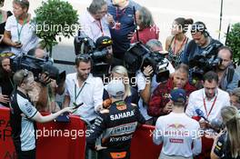 (L to R): Nico Hulkenberg (GER) Sahara Force India F1 and Max Verstappen (NLD) Red Bull Racing with the media. 28.08.2016. Formula 1 World Championship, Rd 13, Belgian Grand Prix, Spa Francorchamps, Belgium, Race Day.