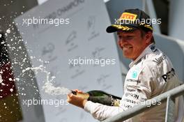 Race winner Nico Rosberg (GER) Mercedes AMG F1 celebrates with the champagne on the podium. 28.08.2016. Formula 1 World Championship, Rd 13, Belgian Grand Prix, Spa Francorchamps, Belgium, Race Day.