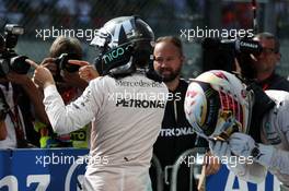 Race winner Nico Rosberg (GER) Mercedes AMG F1 celebrates in parc ferme as his third placed team mate Lewis Hamilton (GBR) climbs from his Mercedes AMG F1 W07 Hybrid. 28.08.2016. Formula 1 World Championship, Rd 13, Belgian Grand Prix, Spa Francorchamps, Belgium, Race Day.