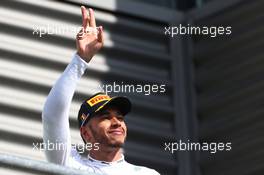 Lewis Hamilton (GBR) Mercedes AMG F1 celebrates his third position on the podium. 28.08.2016. Formula 1 World Championship, Rd 13, Belgian Grand Prix, Spa Francorchamps, Belgium, Race Day.