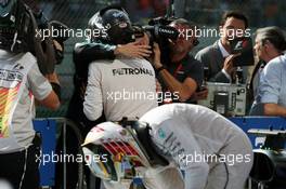 Race winner Nico Rosberg (GER) Mercedes AMG F1 celebrates in parc ferme as his third placed team mate Lewis Hamilton (GBR) climbs from his Mercedes AMG F1 W07 Hybrid. 28.08.2016. Formula 1 World Championship, Rd 13, Belgian Grand Prix, Spa Francorchamps, Belgium, Race Day.