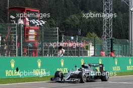 Race winner Nico Rosberg (GER) Mercedes AMG F1 W07 Hybrid celebrates as he takes the chequered flag at the end of the race. 28.08.2016. Formula 1 World Championship, Rd 13, Belgian Grand Prix, Spa Francorchamps, Belgium, Race Day.