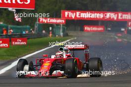 Kimi Raikkonen (FIN) Ferrari SF16-H with a puncture at the start of the race. 28.08.2016. Formula 1 World Championship, Rd 13, Belgian Grand Prix, Spa Francorchamps, Belgium, Race Day.