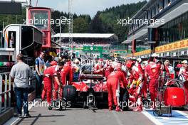 Sebastian Vettel (GER) Ferrari SF16-H in the pits with the race stopped. 28.08.2016. Formula 1 World Championship, Rd 13, Belgian Grand Prix, Spa Francorchamps, Belgium, Race Day.