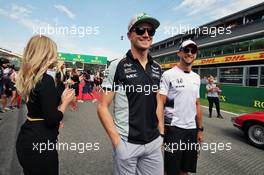 (L to R): Nico Hulkenberg (GER) Sahara Force India F1 with Jenson Button (GBR) McLaren on the drivers parade. 28.08.2016. Formula 1 World Championship, Rd 13, Belgian Grand Prix, Spa Francorchamps, Belgium, Race Day.