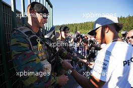 Lewis Hamilton (GBR) Mercedes AMG F1 signs autographs for the armed guards. 25.08.2016. Formula 1 World Championship, Rd 13, Belgian Grand Prix, Spa Francorchamps, Belgium, Preparation Day.
