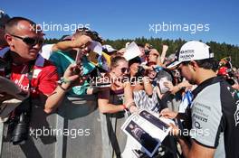 Sergio Perez (MEX) Sahara Force India F1 signs autographs for the fans. 25.08.2016. Formula 1 World Championship, Rd 13, Belgian Grand Prix, Spa Francorchamps, Belgium, Preparation Day.