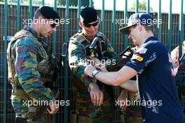 Max Verstappen (NLD) Red Bull Racing signs autographs for the armed guards. 25.08.2016. Formula 1 World Championship, Rd 13, Belgian Grand Prix, Spa Francorchamps, Belgium, Preparation Day.