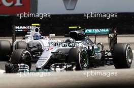 Nico Rosberg (GER) Mercedes AMG F1 W07 Hybrid leads Valtteri Bottas (FIN) Williams FW38. 11.11.2016. Formula 1 World Championship, Rd 20, Brazilian Grand Prix, Sao Paulo, Brazil, Practice Day.