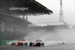 Max Verstappen (NLD) Red Bull Racing RB12 and Esteban Gutierrez (MEX) Haas F1 Team VF-16 battle for position. 13.11.2016. Formula 1 World Championship, Rd 20, Brazilian Grand Prix, Sao Paulo, Brazil, Race Day.