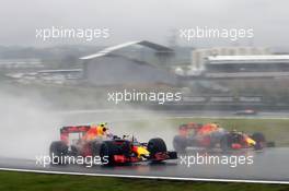 Max Verstappen (NLD) Red Bull Racing RB12 and team mate Daniel Ricciardo (AUS) Red Bull Racing RB12 battle for position. 13.11.2016. Formula 1 World Championship, Rd 20, Brazilian Grand Prix, Sao Paulo, Brazil, Race Day.