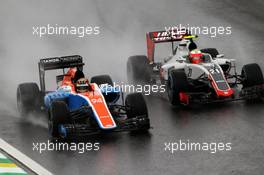 (L to R): Pascal Wehrlein (GER) Manor Racing MRT05 and Esteban Gutierrez (MEX) Haas F1 Team VF-16 battle for position. 13.11.2016. Formula 1 World Championship, Rd 20, Brazilian Grand Prix, Sao Paulo, Brazil, Race Day.