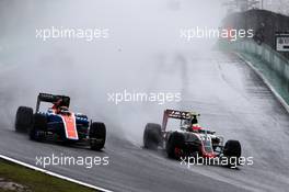 (L to R): Pascal Wehrlein (GER) Manor Racing MRT05 and Esteban Gutierrez (MEX) Haas F1 Team VF-16 battle for position. 13.11.2016. Formula 1 World Championship, Rd 20, Brazilian Grand Prix, Sao Paulo, Brazil, Race Day.