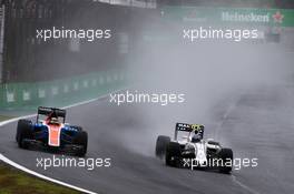 (L to R): Pascal Wehrlein (GER) Manor Racing MRT05 and Valtteri Bottas (FIN) Williams FW38 battle for position. 13.11.2016. Formula 1 World Championship, Rd 20, Brazilian Grand Prix, Sao Paulo, Brazil, Race Day.