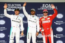 Qualifying top three in parc ferme (L to R): Nico Rosberg (GER) Mercedes AMG F1, second; Lewis Hamilton (GBR) Mercedes AMG F1, pole position; Kimi Raikkonen (FIN) Ferrari, third. 12.11.2016. Formula 1 World Championship, Rd 20, Brazilian Grand Prix, Sao Paulo, Brazil, Qualifying Day.