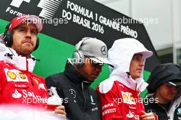 (L to R): Sebastian Vettel (GER) Ferrari with Lewis Hamilton (GBR) Mercedes AMG F1, Kimi Raikkonen (FIN) Ferrari, and Nico Rosberg (GER) Mercedes AMG F1, on the drivers parade. 13.11.2016. Formula 1 World Championship, Rd 20, Brazilian Grand Prix, Sao Paulo, Brazil, Race Day.