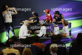 Matteo Bonciani (ITA) FIA Media Delegate (Left) in the FIA Press Conference photographing (from back row (L to R)): Daniel Ricciardo (AUS) Red Bull Racing; Sebastian Vettel (GER) Ferrari; Max Verstappen (NLD) Red Bull Racing; Charlie Whiting (GBR) FIA Delegate; Lewis Hamilton (GBR) Mercedes AMG F1; Felipe Massa (BRA) Williams; Nico Rosberg (GER) Mercedes AMG F1. 10.11.2016. Formula 1 World Championship, Rd 20, Brazilian Grand Prix, Sao Paulo, Brazil, Preparation Day.