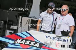 Felipe Massa (BRA) and his father Luis Antonio Massa (BRA), with a specially liveried Williams FW38 marking his retirement from F1. 10.11.2016. Formula 1 World Championship, Rd 20, Brazilian Grand Prix, Sao Paulo, Brazil, Preparation Day.