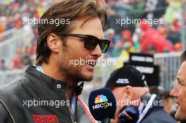 (L to R): Tom Brady (USA) New England Patriots Quarterback with Will Buxton (GBR) NBC Sports Network TV Presenter on the grid. 12.06.2016. Formula 1 World Championship, Rd 7, Canadian Grand Prix, Montreal, Canada, Race Day.