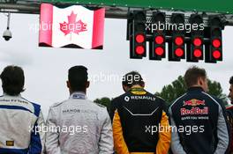 The grid observes the national anthem. 12.06.2016. Formula 1 World Championship, Rd 7, Canadian Grand Prix, Montreal, Canada, Race Day.