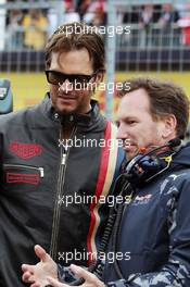 Christian Horner (GBR) Red Bull Racing Team Principal with Tom Brady (USA) New England Patriots Quarterback on the grid. 12.06.2016. Formula 1 World Championship, Rd 7, Canadian Grand Prix, Montreal, Canada, Race Day.