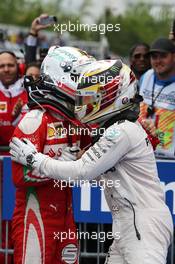 Race winner Lewis Hamilton (GBR) Mercedes AMG F1 celebrates in parc ferme with Sebastian Vettel (GER) Ferrari. 12.06.2016. Formula 1 World Championship, Rd 7, Canadian Grand Prix, Montreal, Canada, Race Day.