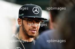 Lewis Hamilton (GBR) Mercedes AMG F1 with the media. 15.04.2016. Formula 1 World Championship, Rd 3, Chinese Grand Prix, Shanghai, China, Practice Day.