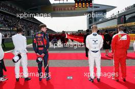 Max Verstappen (NLD) Scuderia Toro Rosso and Valtteri Bottas (FIN) Williams as the grid observes the national anthem. Lewis Hamilton (GBR) Mercedes AMG F1 is missing. 17.04.2016. Formula 1 World Championship, Rd 3, Chinese Grand Prix, Shanghai, China, Race Day.