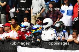 Fans in the grandstand. 17.04.2016. Formula 1 World Championship, Rd 3, Chinese Grand Prix, Shanghai, China, Race Day.