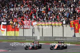 Esteban Gutierrez (MEX) Haas F1 Team VF-16 and Pascal Wehrlein (GER) Manor Racing MRT05 battle for position. 17.04.2016. Formula 1 World Championship, Rd 3, Chinese Grand Prix, Shanghai, China, Race Day.