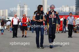 Carlos Sainz Jr (ESP) Scuderia Toro Rosso with Tabatha Valles (ESP) Scuderia Toro Rosso Press Officer. 17.04.2016. Formula 1 World Championship, Rd 3, Chinese Grand Prix, Shanghai, China, Race Day.