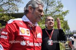 (L to R): Maurizio Arrivabene (ITA) Ferrari Team Principal with Sergio Marchionne (ITA), Ferrari President and CEO of Fiat Chrysler Automobiles. 17.04.2016. Formula 1 World Championship, Rd 3, Chinese Grand Prix, Shanghai, China, Race Day.