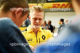 Kevin Magnussen (DEN) Renault Sport F1 Team signs autographs for the fans. 14.04.2016. Formula 1 World Championship, Rd 3, Chinese Grand Prix, Shanghai, China, Preparation Day.
