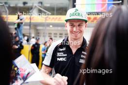 Nico Hulkenberg (GER) Sahara Force India F1 signs autographs for the fans. 14.04.2016. Formula 1 World Championship, Rd 3, Chinese Grand Prix, Shanghai, China, Preparation Day.