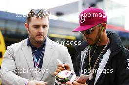 Lewis Hamilton (GBR) Mercedes AMG F1 signs autographs for the fans. 13.05.2016. Formula 1 World Championship, Rd 5, Spanish Grand Prix, Barcelona, Spain, Practice Day.
