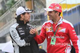 (L to R): Sergio Perez (MEX) Sahara Force India F1 with Marc Gene (ESP) Ferrari Test Driver. 13.05.2016. Formula 1 World Championship, Rd 5, Spanish Grand Prix, Barcelona, Spain, Practice Day.