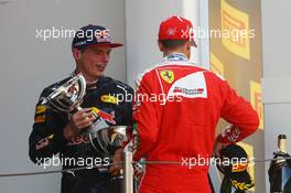 Race winner Max Verstappen (NLD) Red Bull Racing celebrates on the podium with third placed Sebastian Vettel (GER) Ferrari. 15.05.2016. Formula 1 World Championship, Rd 5, Spanish Grand Prix, Barcelona, Spain, Race Day.