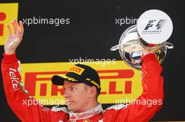 Kimi Raikkonen (FIN) Ferrari celebrates his second position on the podium. 15.05.2016. Formula 1 World Championship, Rd 5, Spanish Grand Prix, Barcelona, Spain, Race Day.
