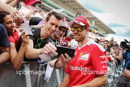 Sebastian Vettel (GER) Ferrari with fans. 12.05.2016. Formula 1 World Championship, Rd 5, Spanish Grand Prix, Barcelona, Spain, Preparation Day.